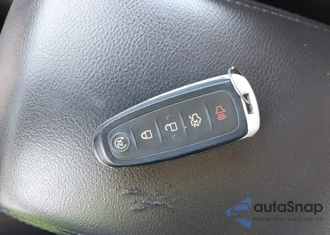 2014 Ford Focus Titanium z USA, uszkodzony, nr VIN 1FADP3N26EL458386